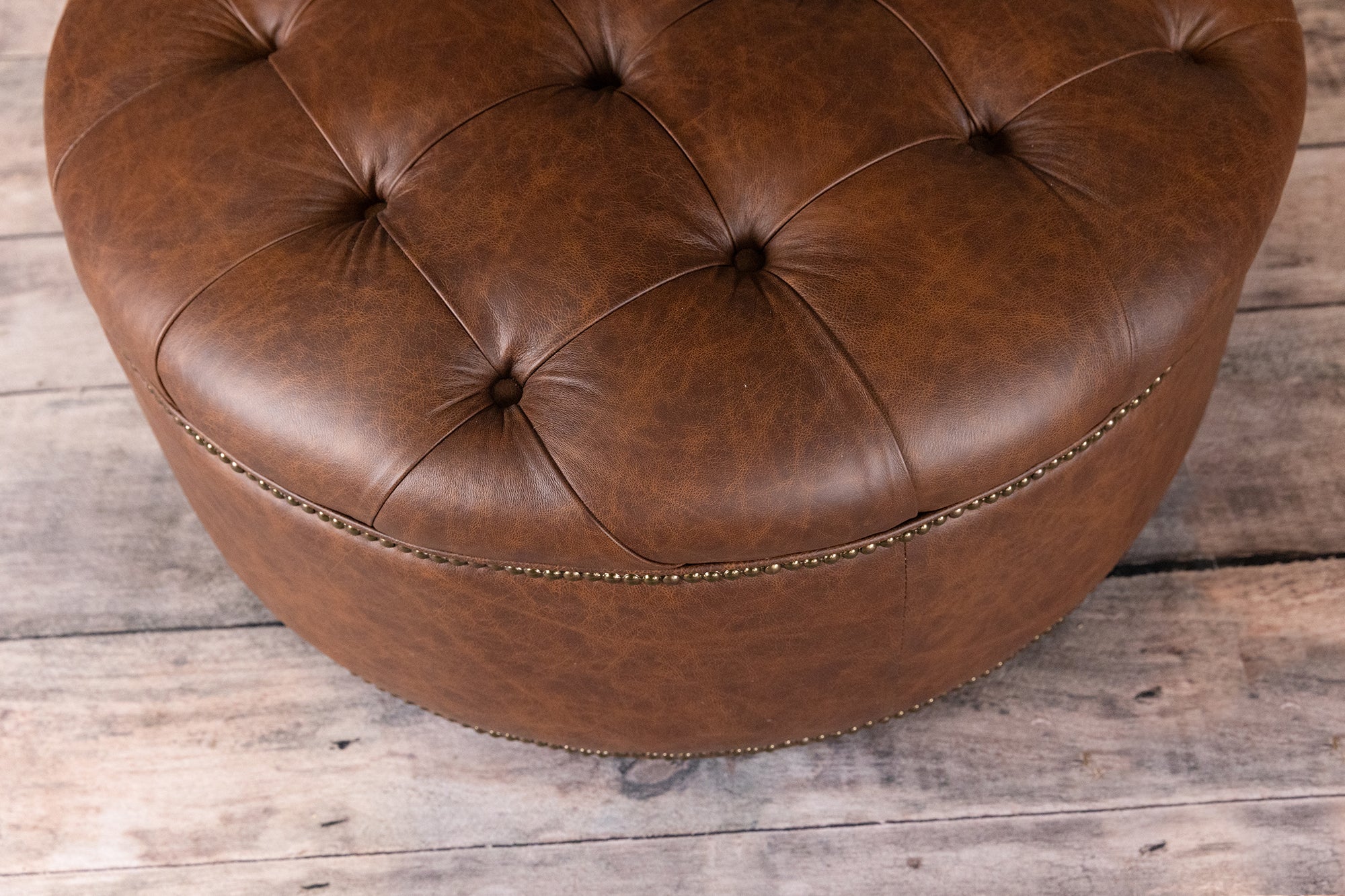 ARTHUR ROUND TUFTED OTTOMAN