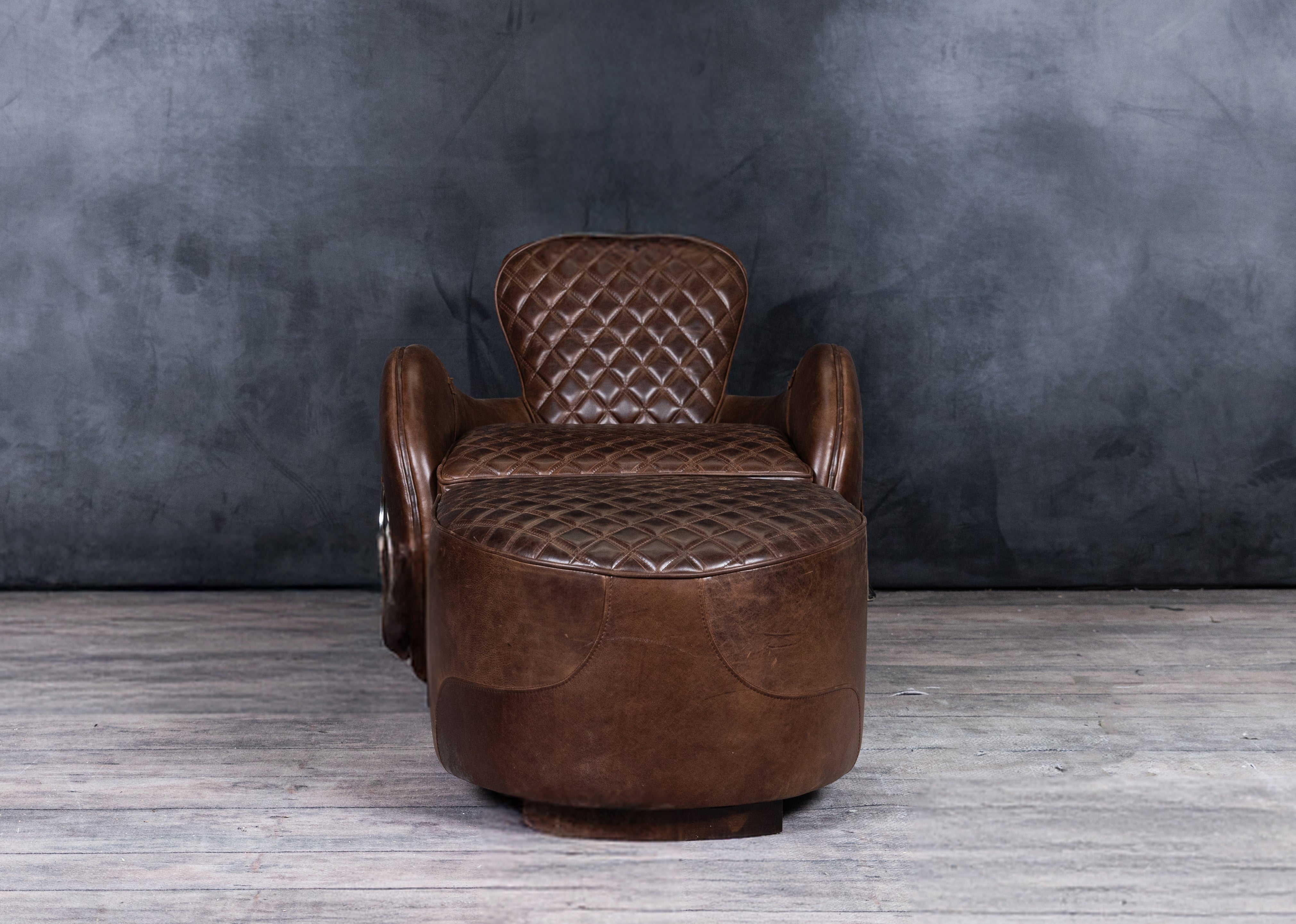 EQUESTRIAN LEATHER CHAIR AND OTTOMAN