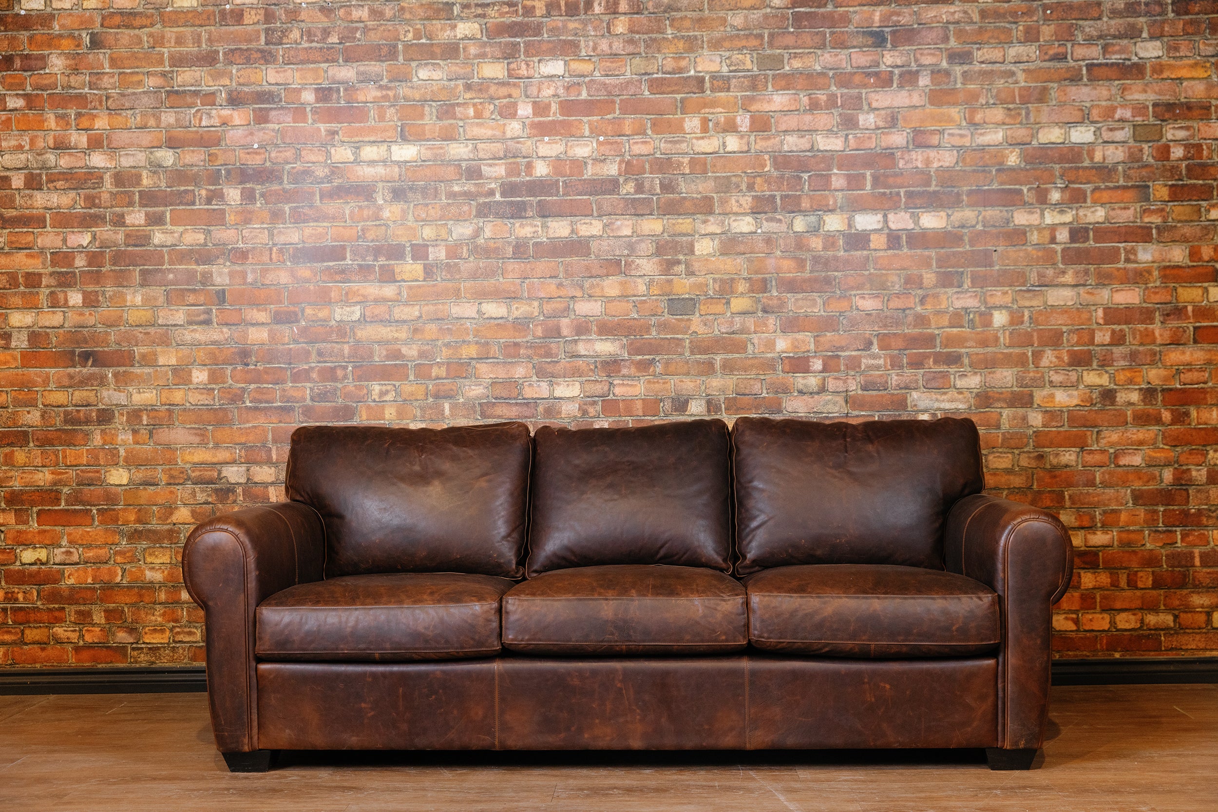 SHELDON LEATHER SOFA FLOOR MODEL PREMIUM BROWN LEATHER AS IS