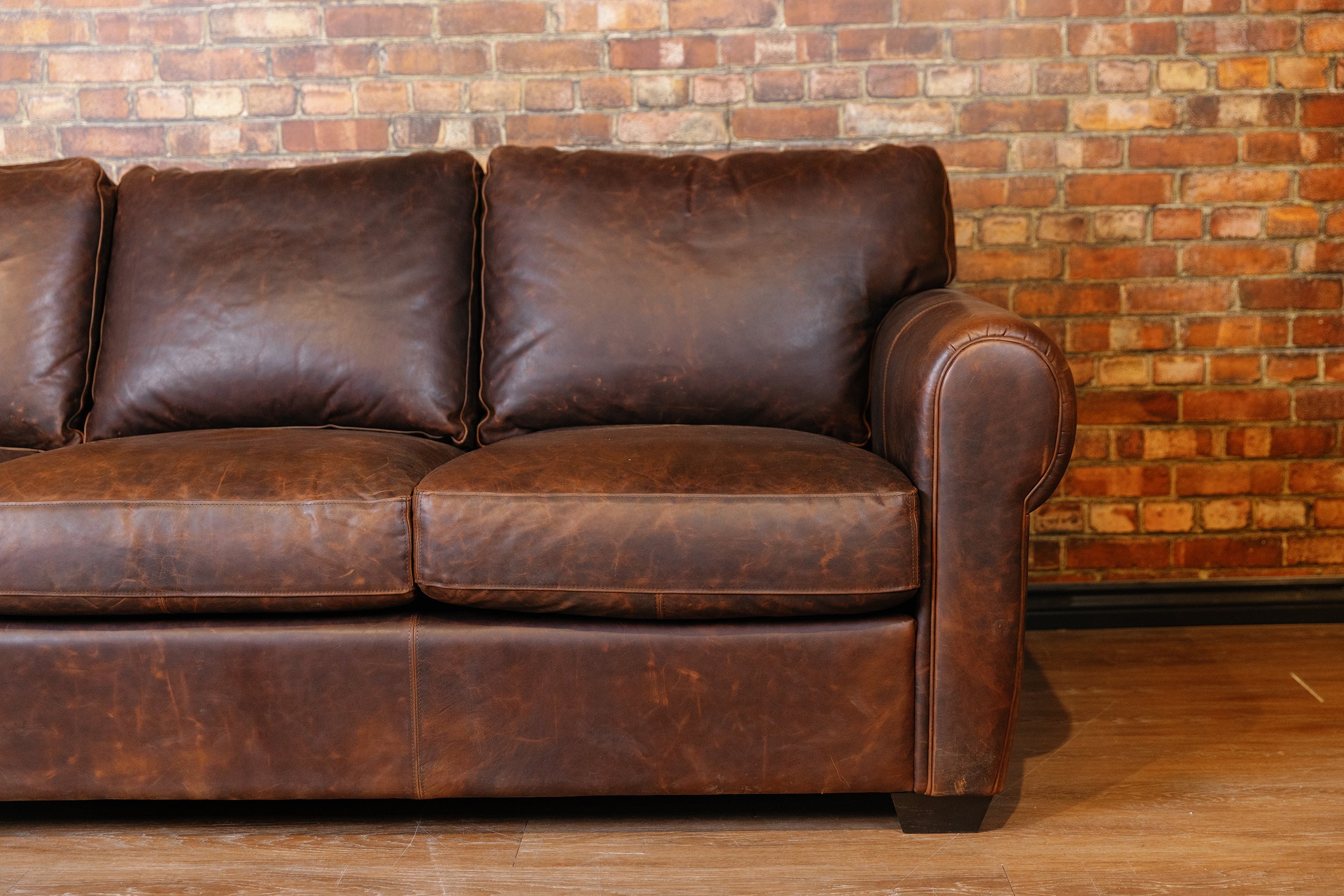 SHELDON LEATHER SOFA FLOOR MODEL PREMIUM BROWN LEATHER AS IS