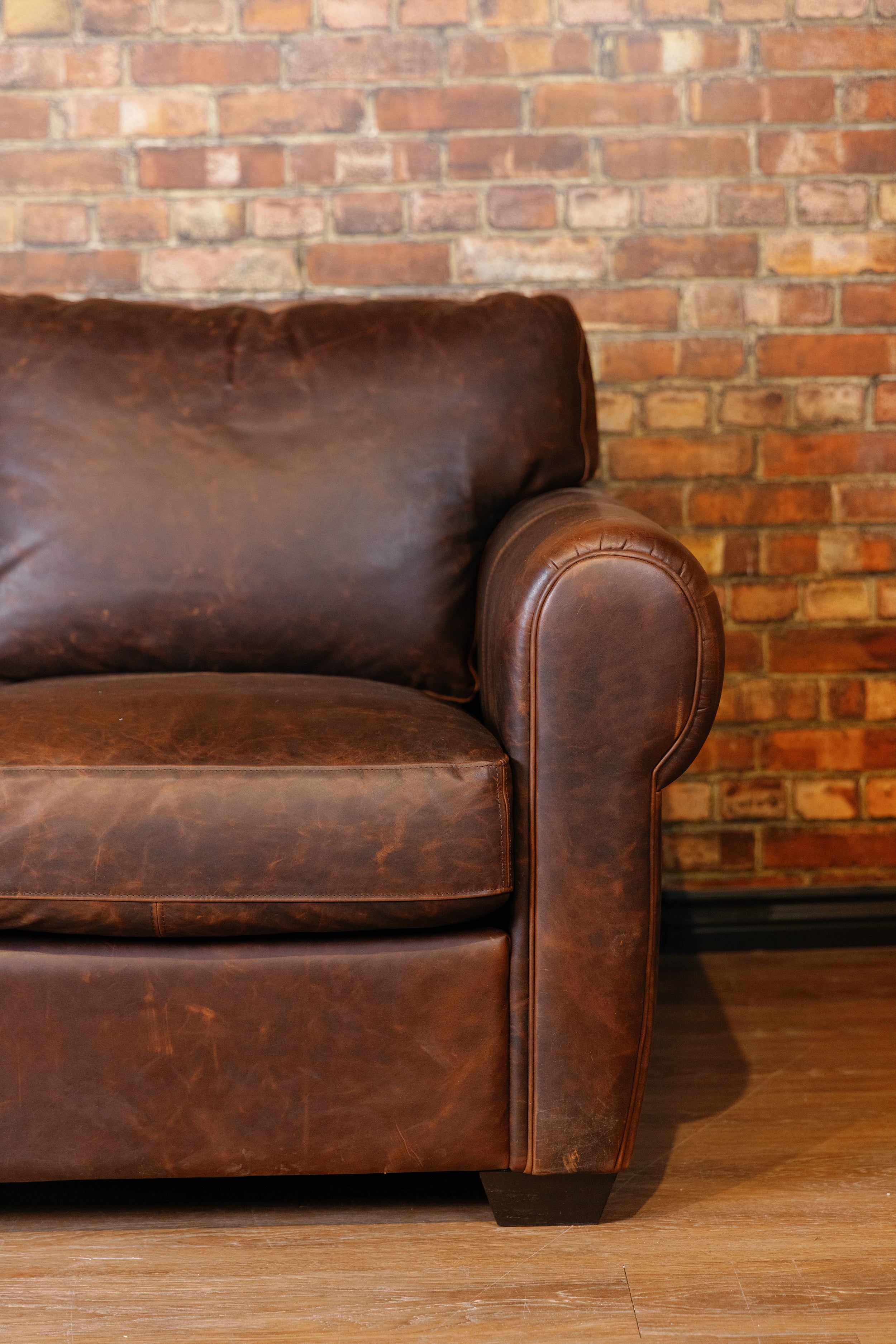 SHELDON LEATHER SOFA FLOOR MODEL PREMIUM BROWN LEATHER AS IS