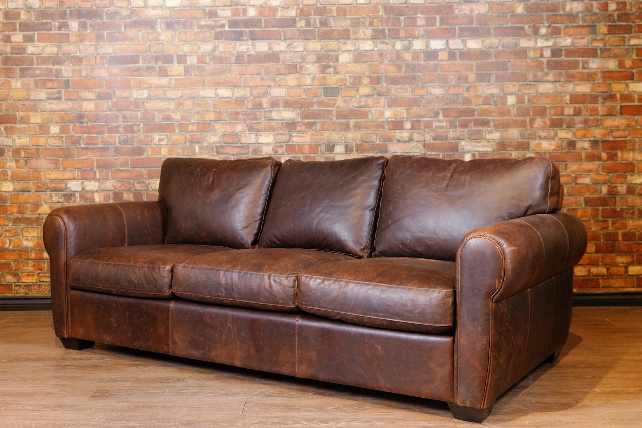 SHELDON LEATHER SOFA FLOOR MODEL PREMIUM BROWN LEATHER AS IS