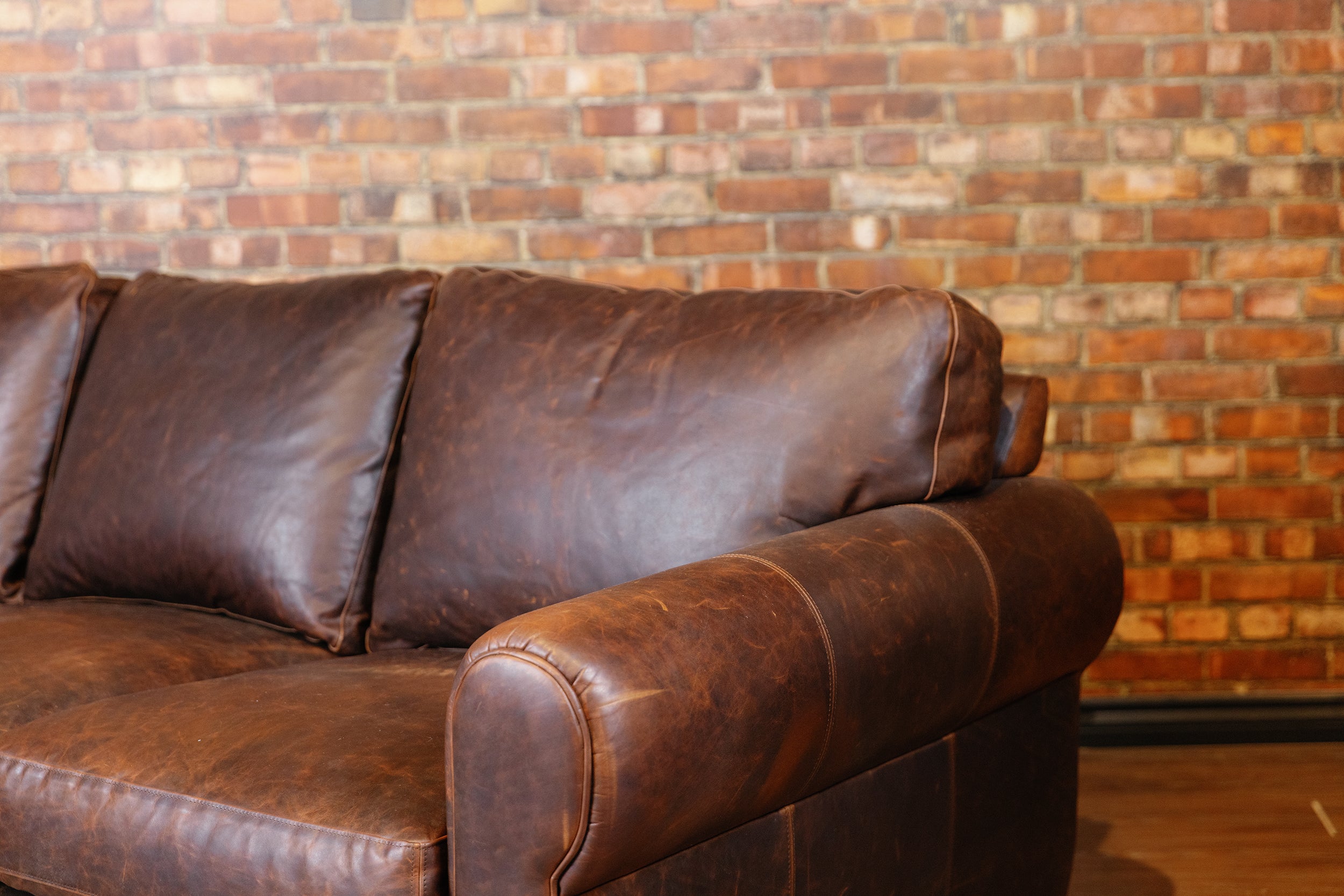 SHELDON LEATHER SOFA FLOOR MODEL PREMIUM BROWN LEATHER AS IS