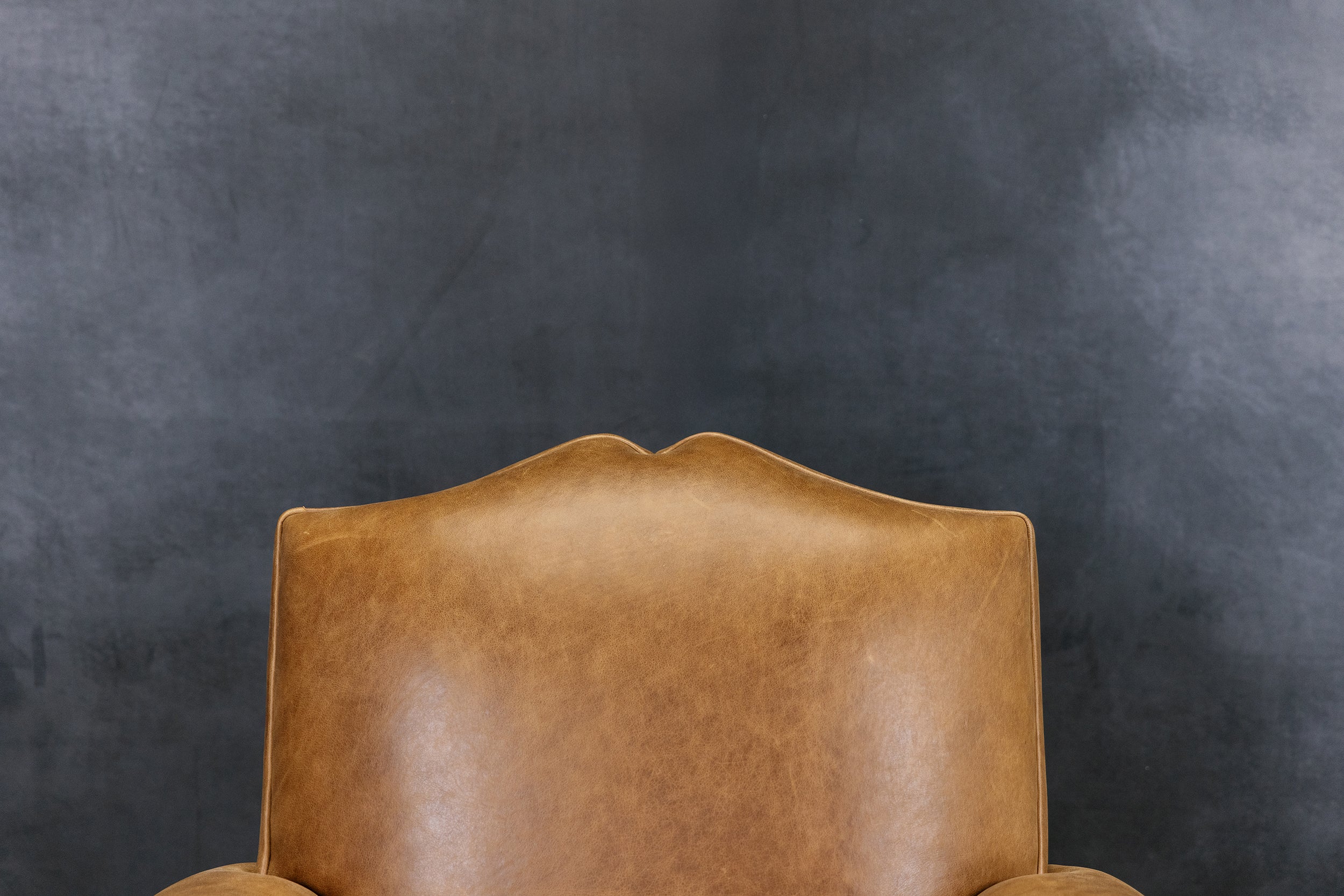 MOUSTACHE LEATHER CIGAR SWIVEL CHAIR