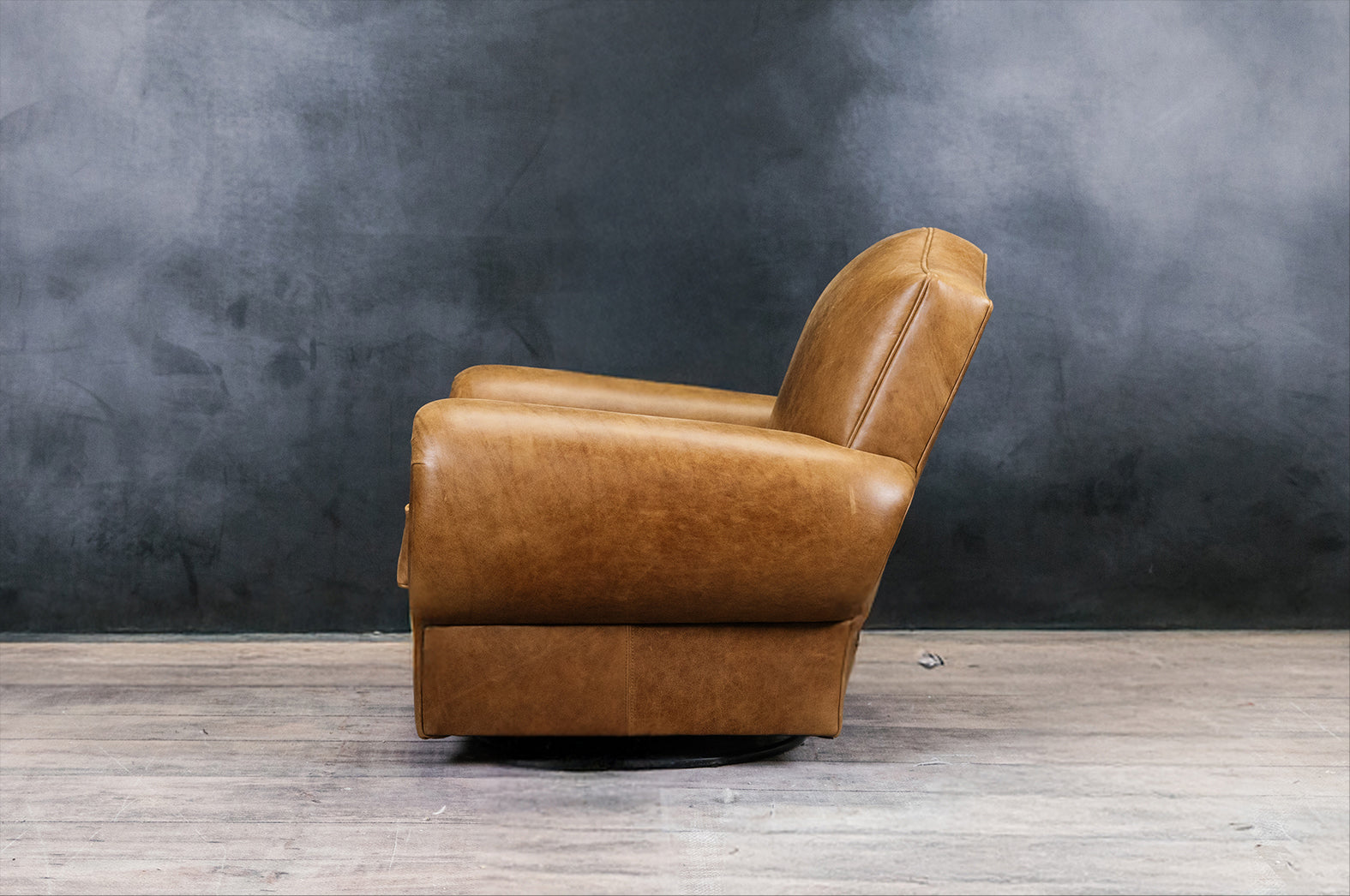 MOUSTACHE LEATHER CIGAR SWIVEL CHAIR