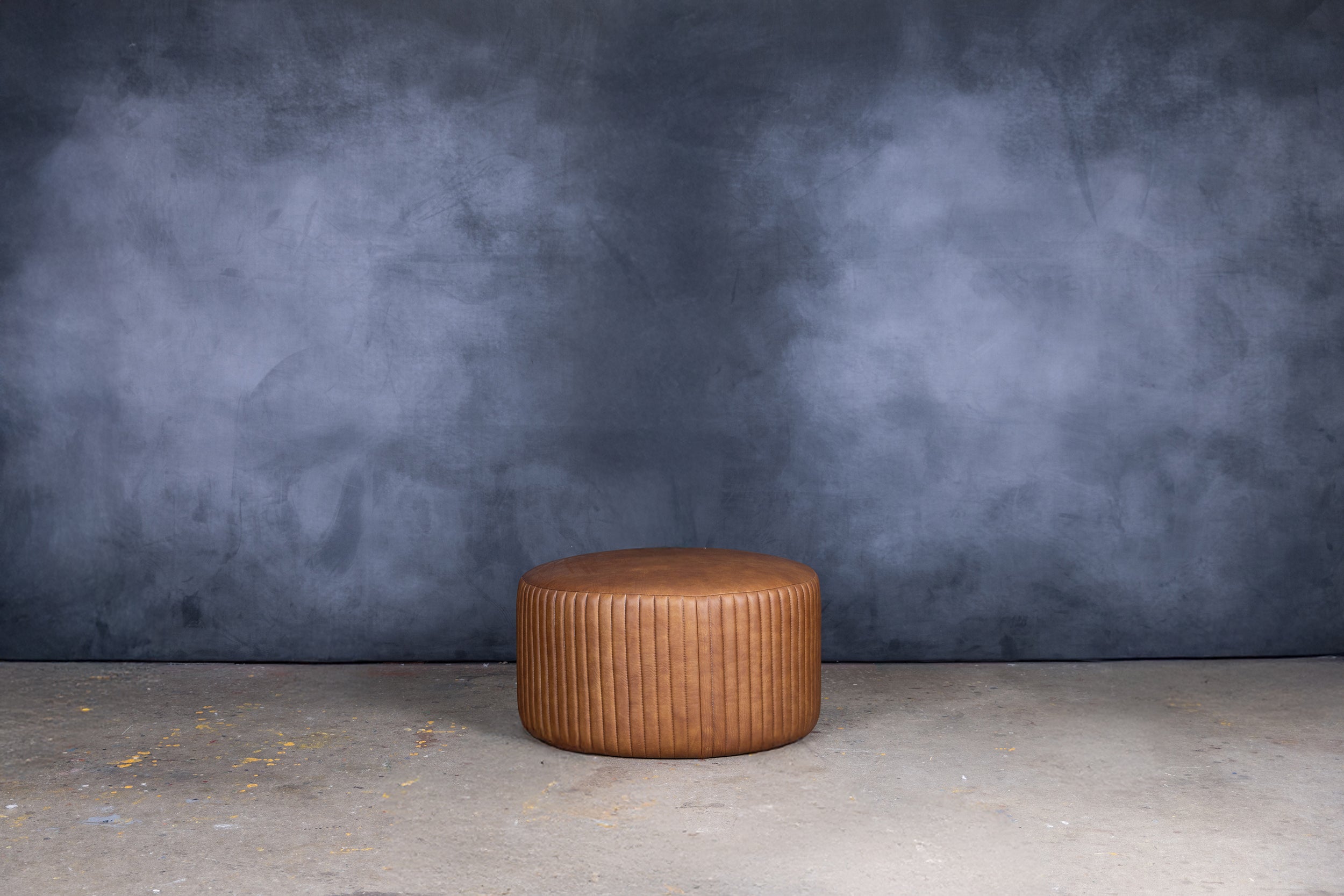 BOHEMIAN ROUND LEATHER OTTOMAN