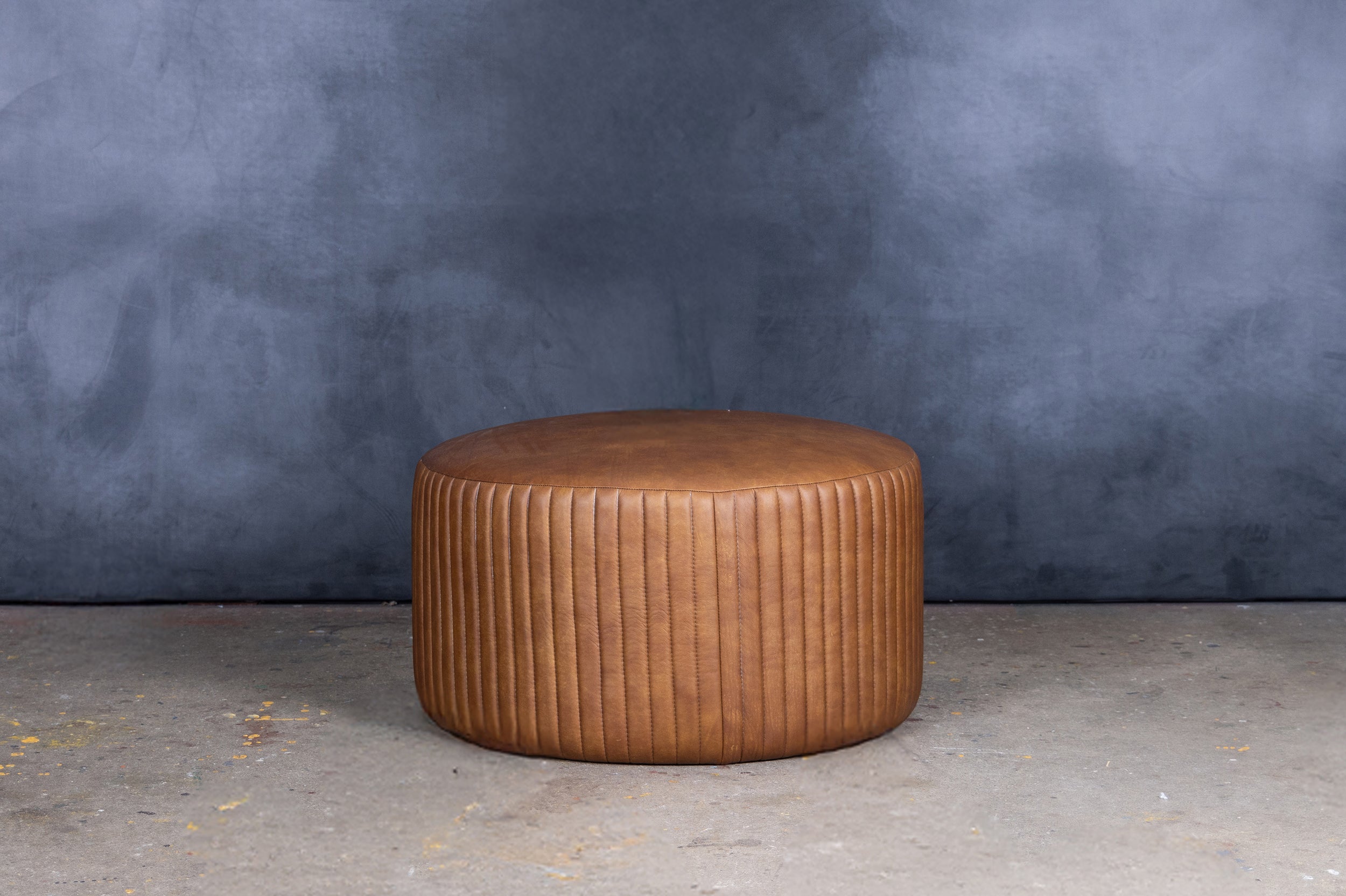 BOHEMIAN ROUND LEATHER OTTOMAN