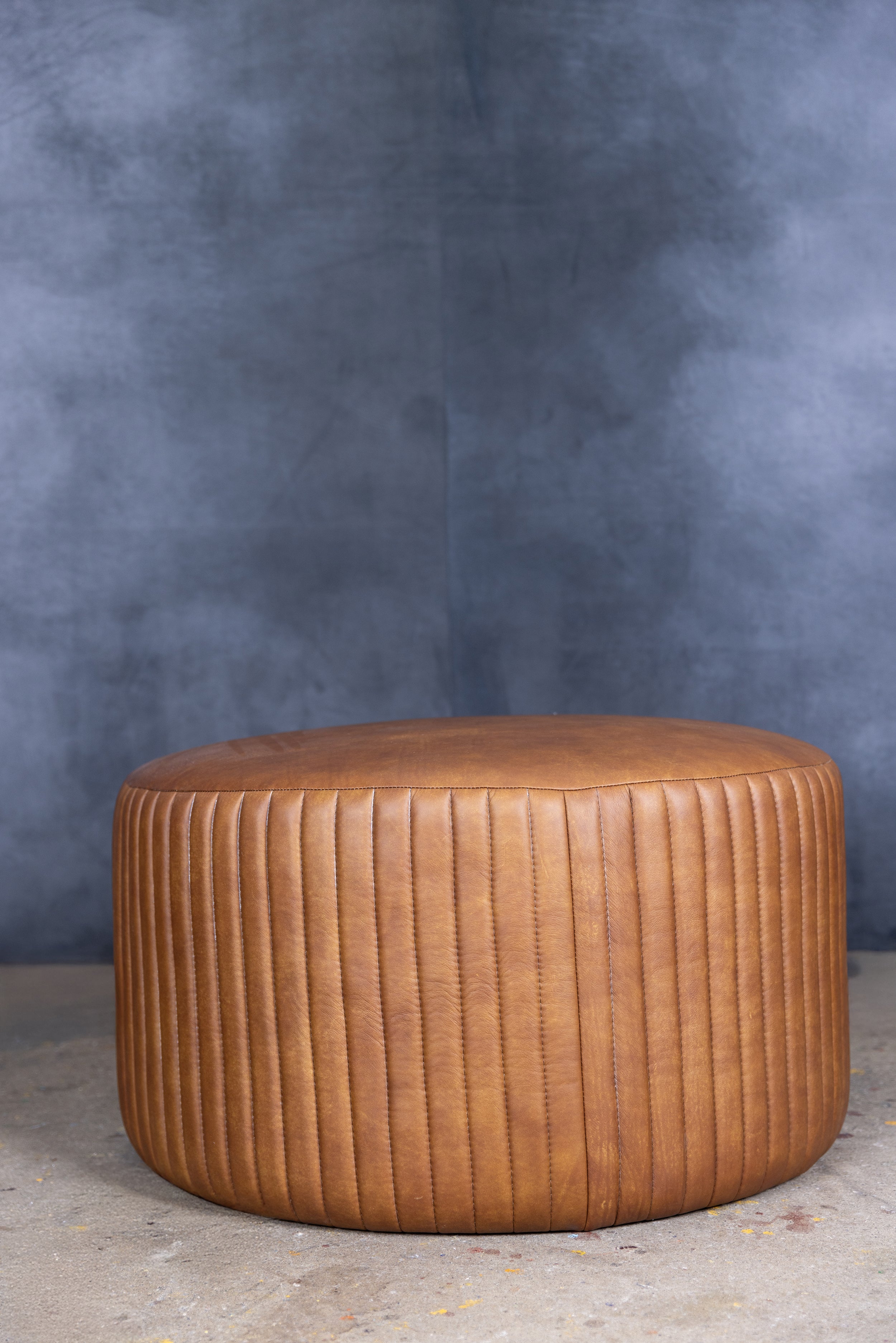 BOHEMIAN ROUND LEATHER OTTOMAN