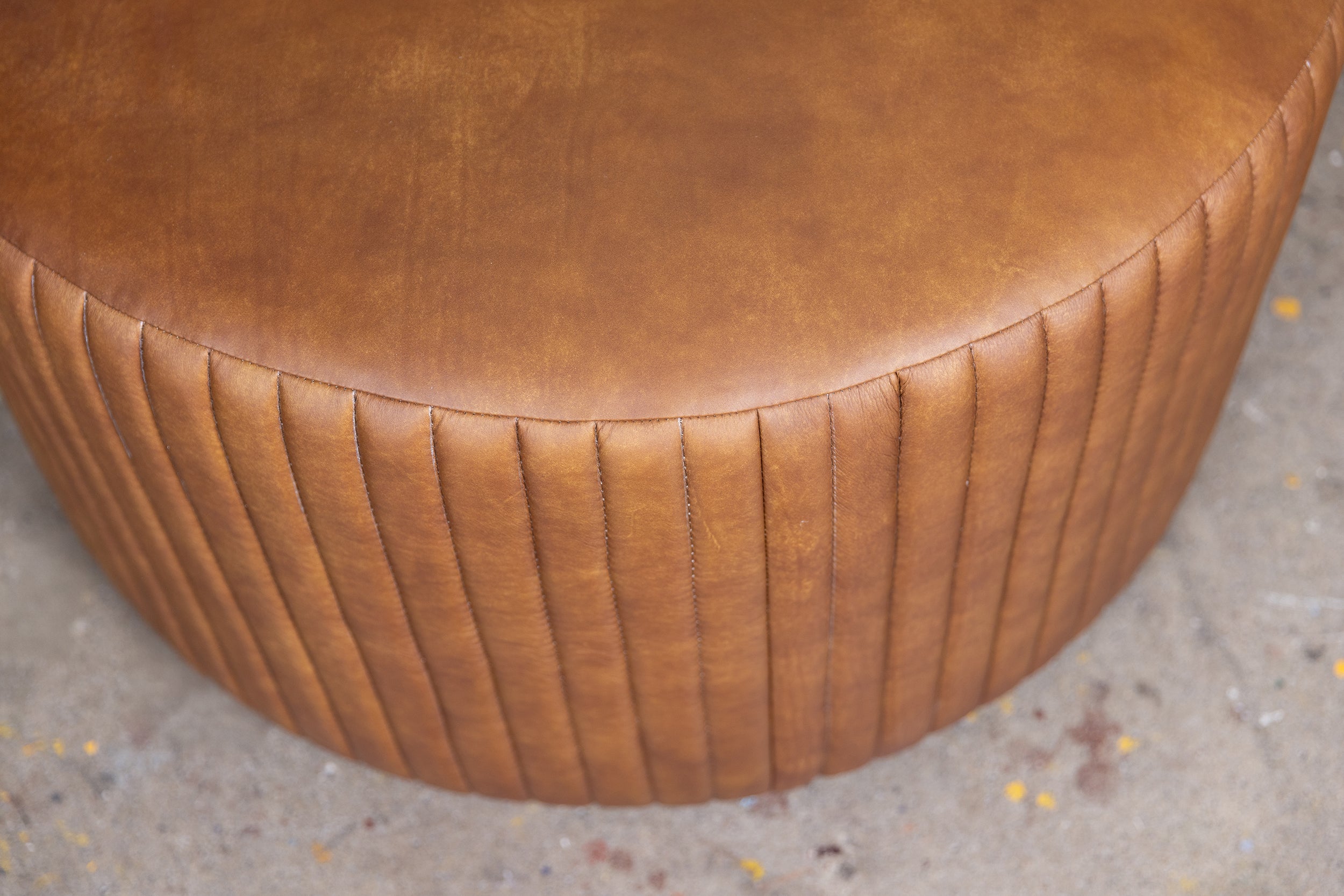 BOHEMIAN ROUND LEATHER OTTOMAN