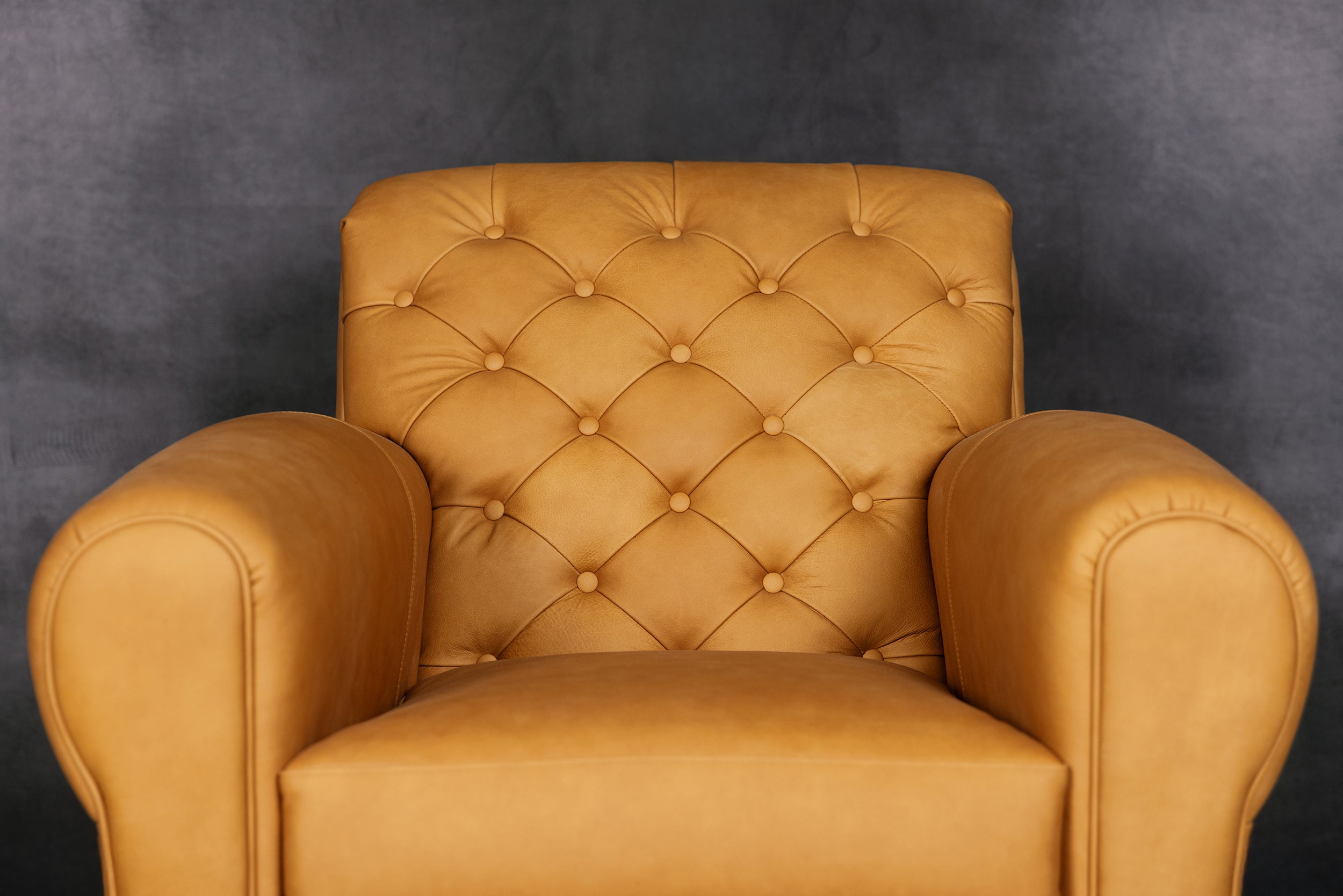 BACHELOR TUFTED BACK CHAIR