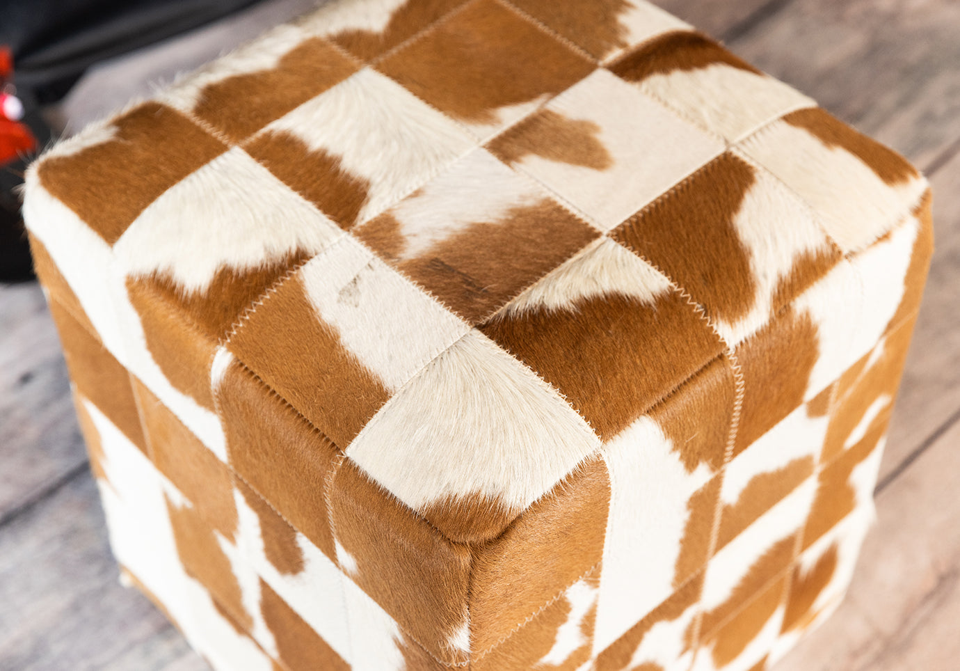 COWHIDE OTTOMAN