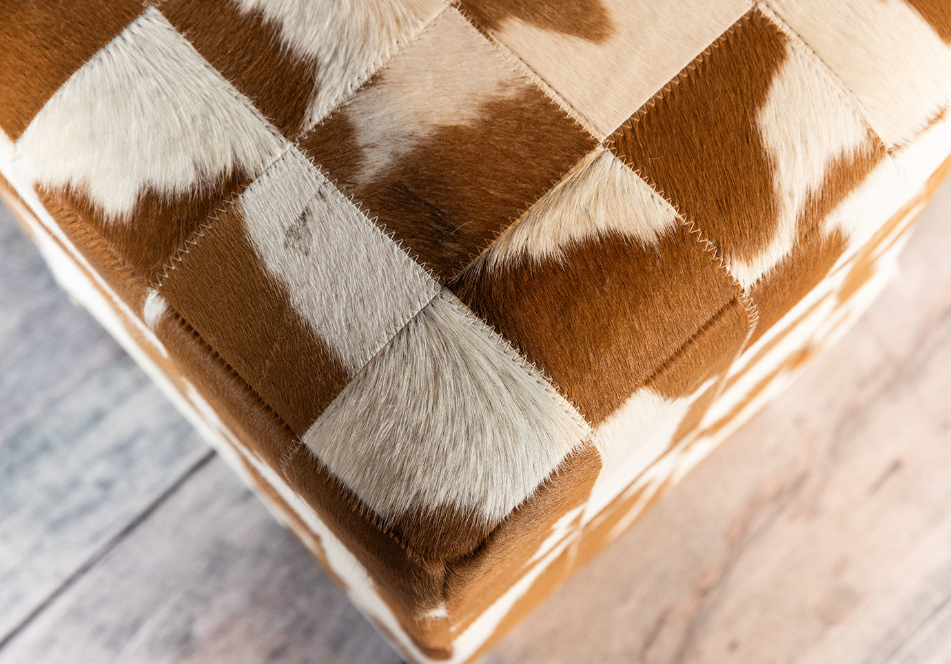 COWHIDE OTTOMAN