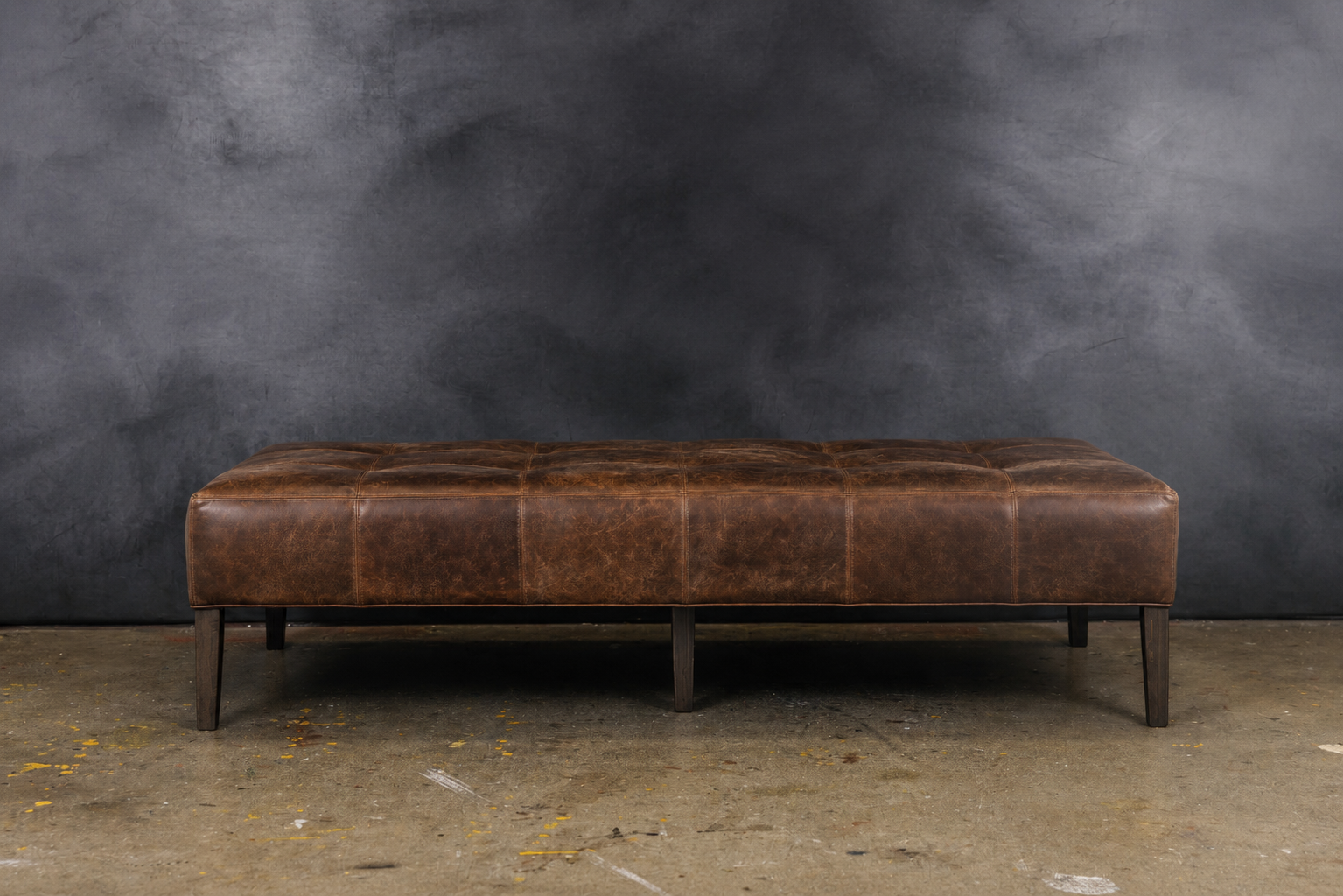 LEATHER OTTOMAN EXPLORER