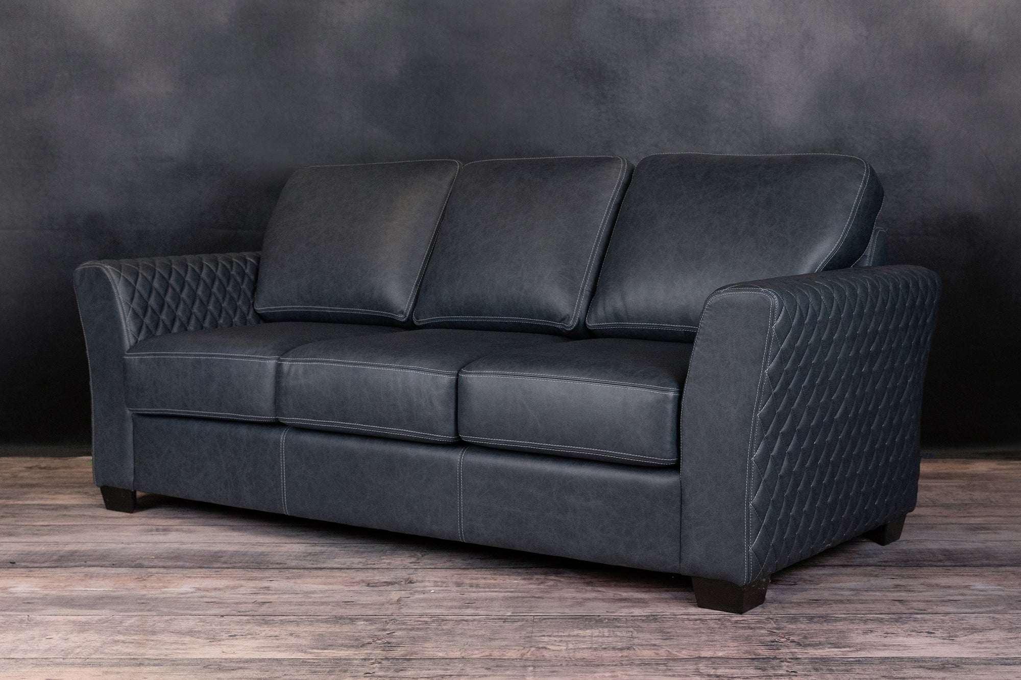 QUINTESSENCE LEATHER SOFA BED