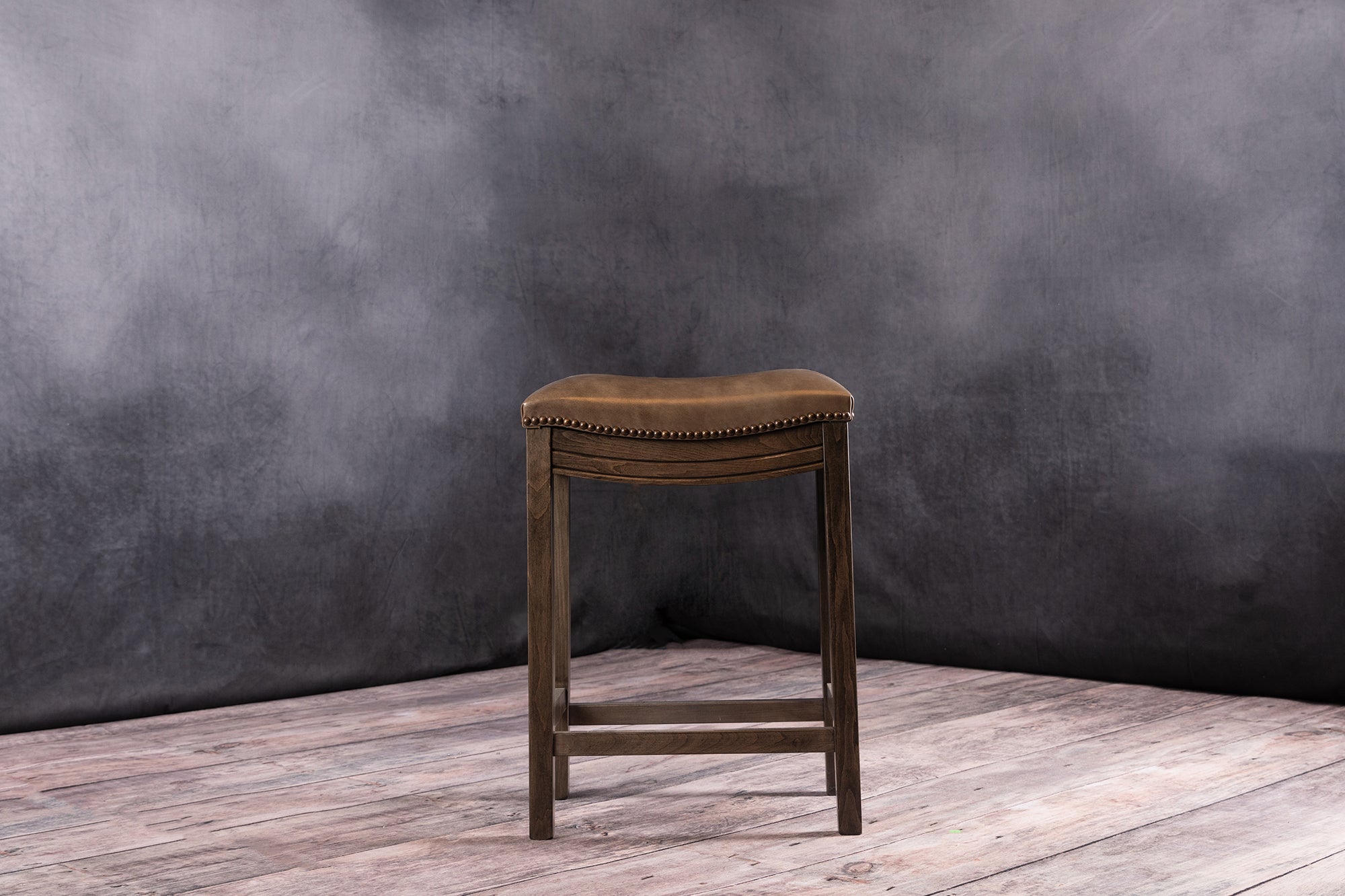 SADDLE COUNTER STOOL
