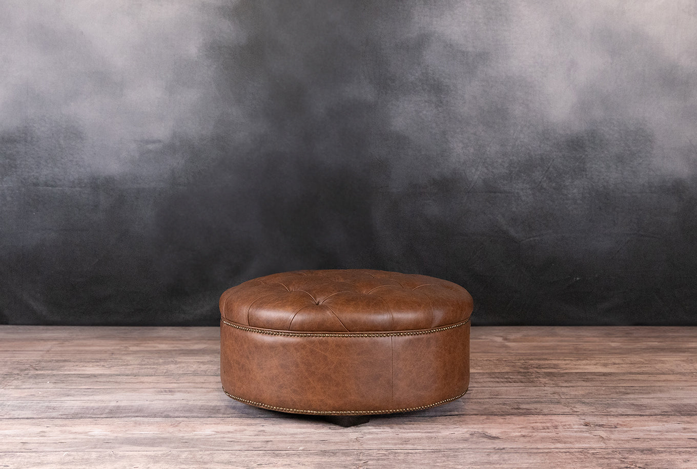 ARTHUR ROUND TUFTED OTTOMAN