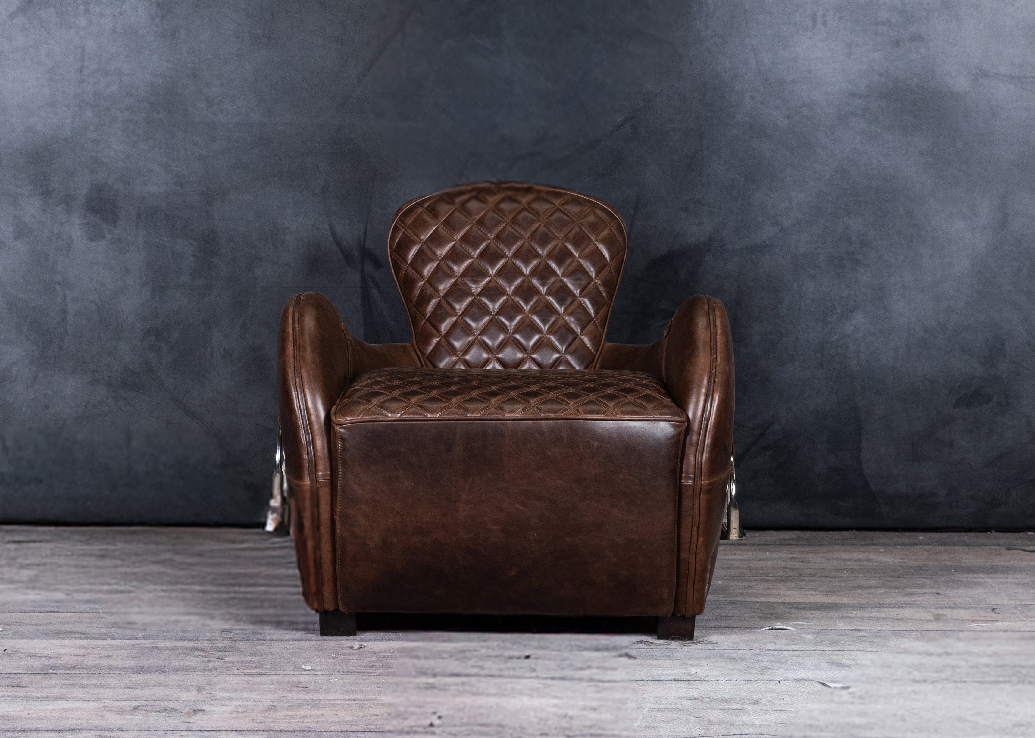 EQUESTRIAN LEATHER CHAIR AND OTTOMAN