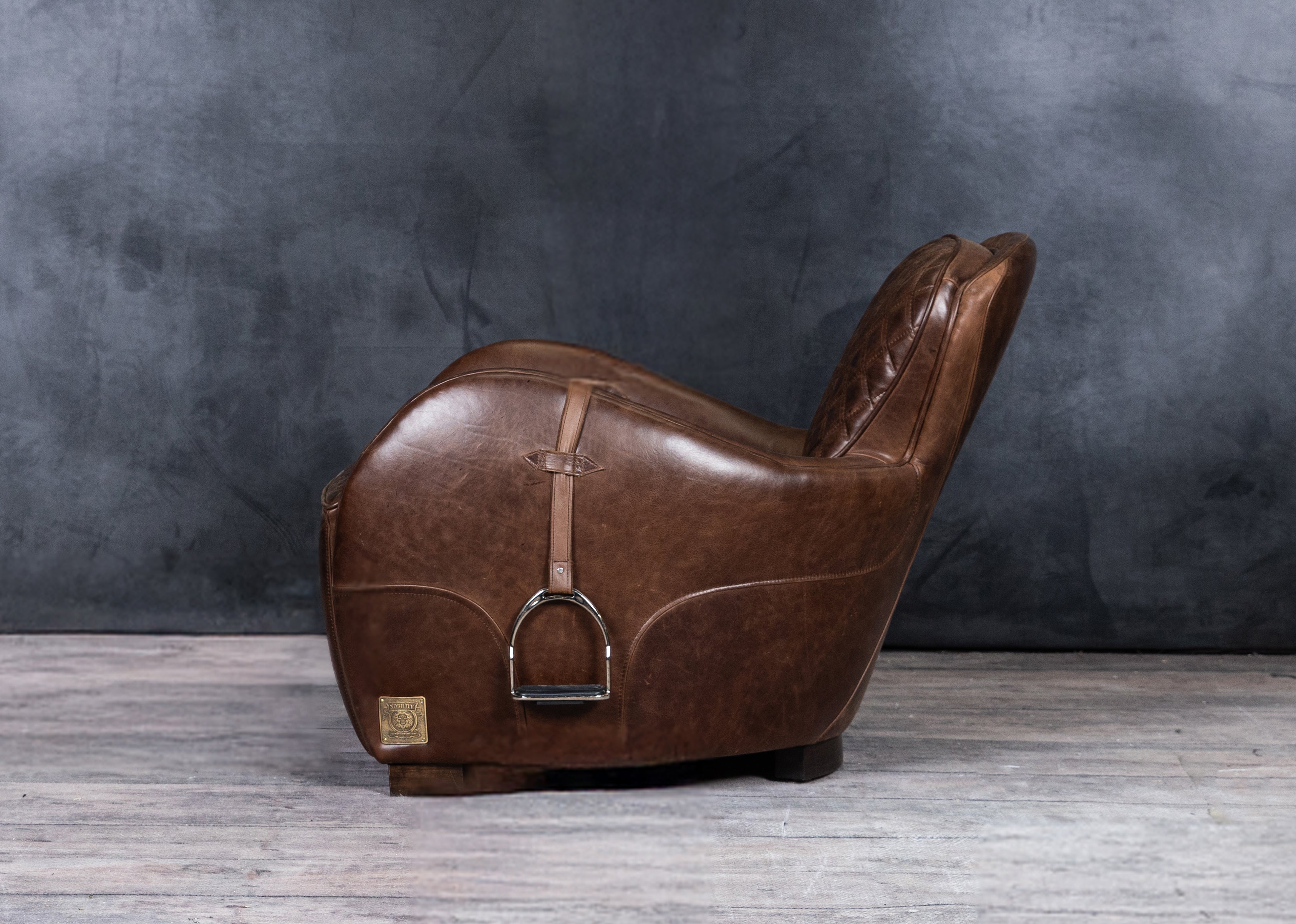 EQUESTRIAN LEATHER CHAIR AND OTTOMAN