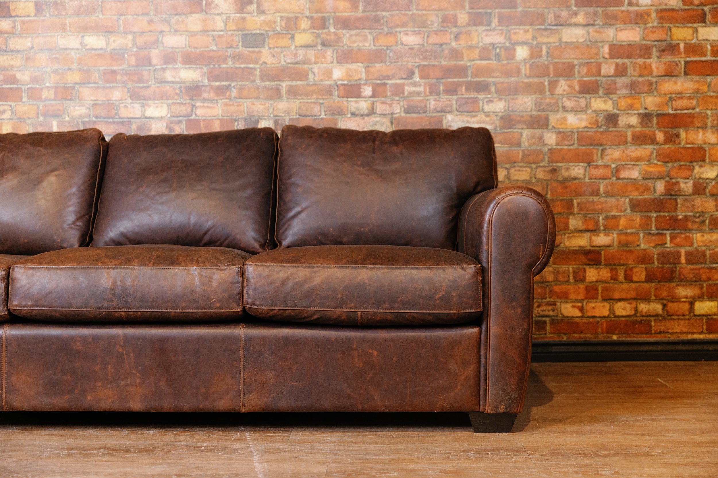 SHELDON LEATHER SOFA FLOOR MODEL PREMIUM BROWN LEATHER AS IS