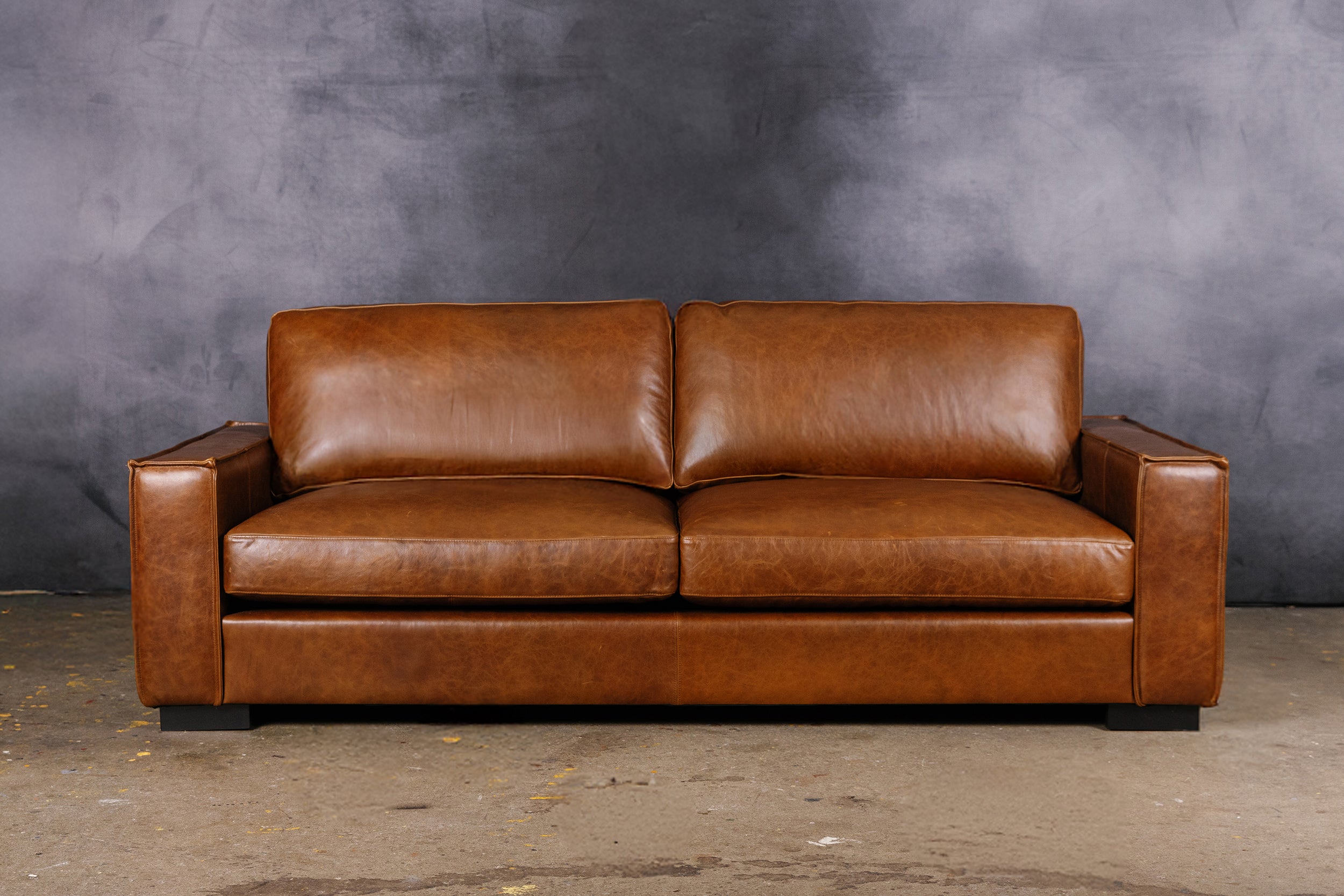 THE BATTALION  LEATHER SOFA