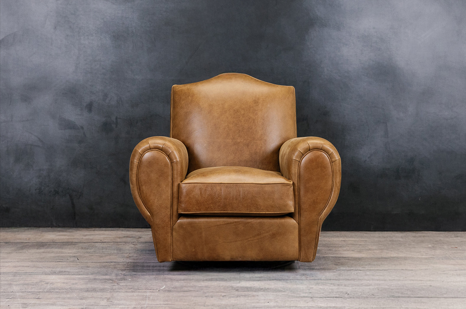 MOUSTACHE LEATHER CIGAR SWIVEL CHAIR