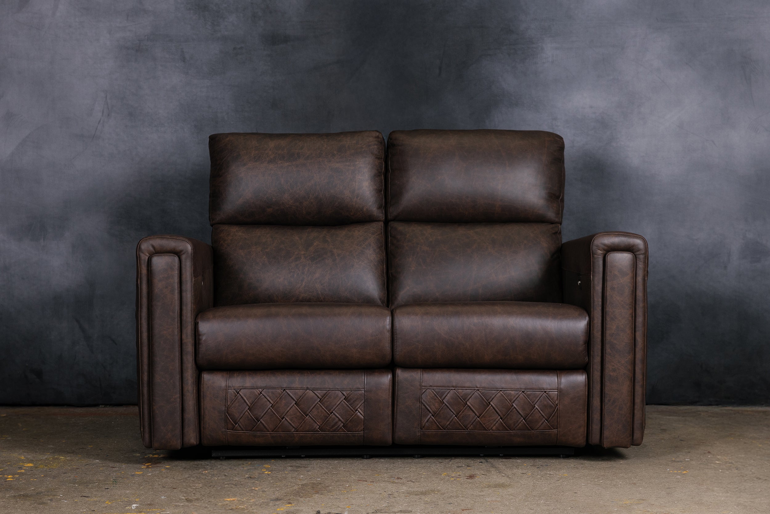 THE CONTINENTAL LEATHER RECLINER LOVESEAT