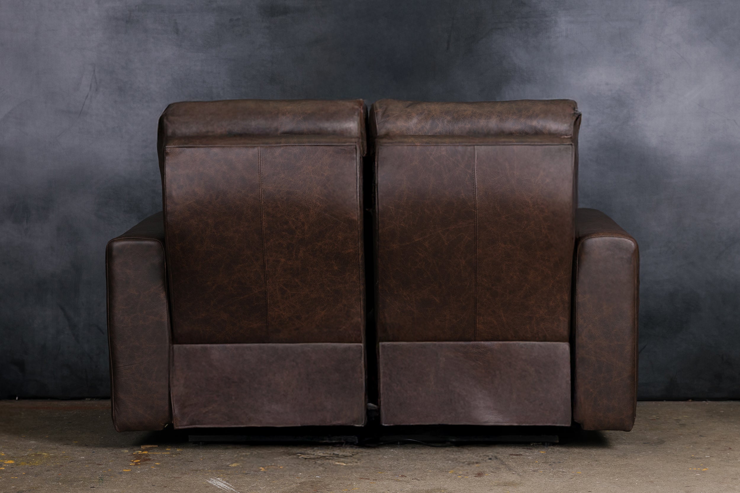 THE CONTINENTAL LEATHER RECLINER LOVESEAT