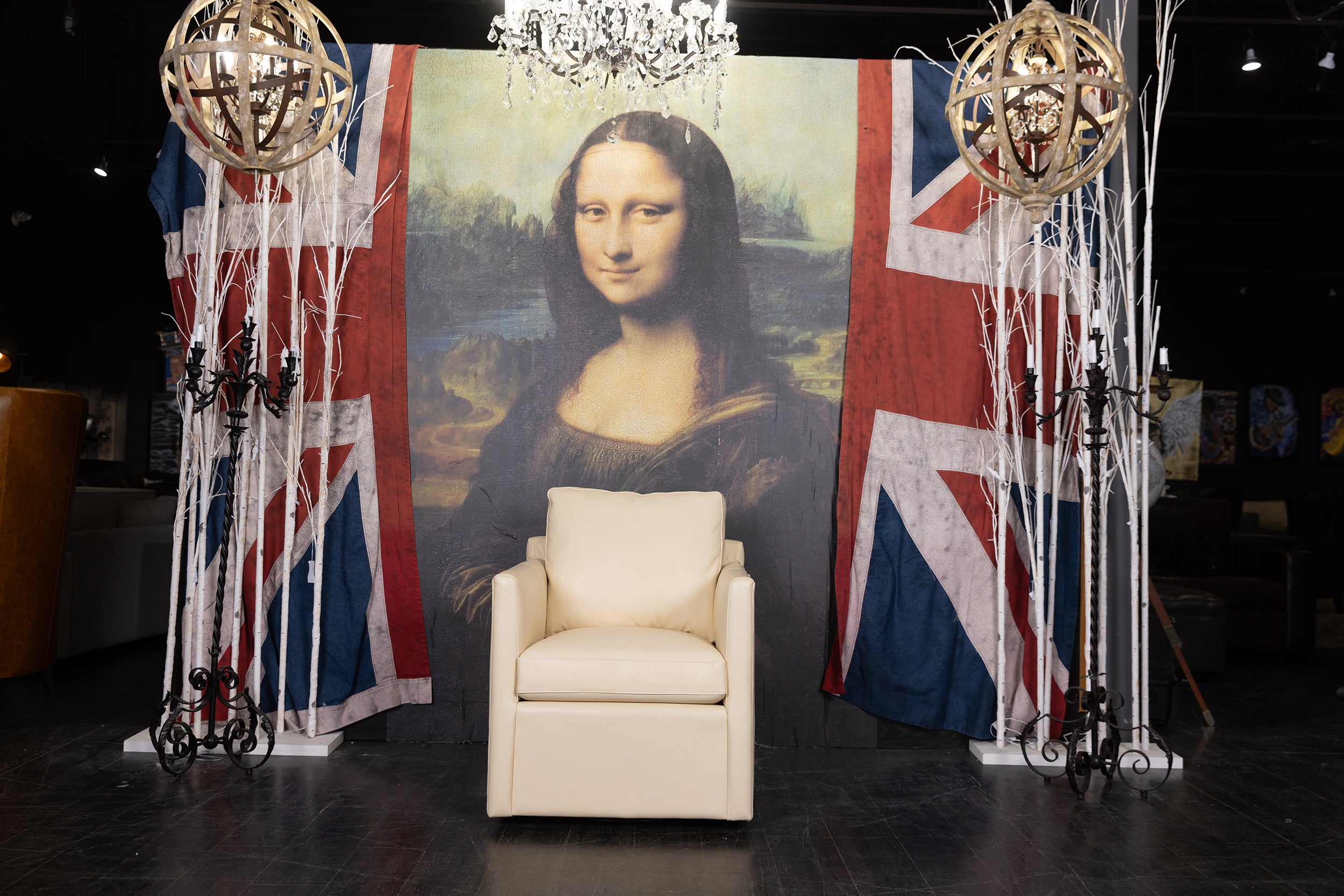 LIONEL LEATHER SWIVEL CHAIR FLOOR MODEL