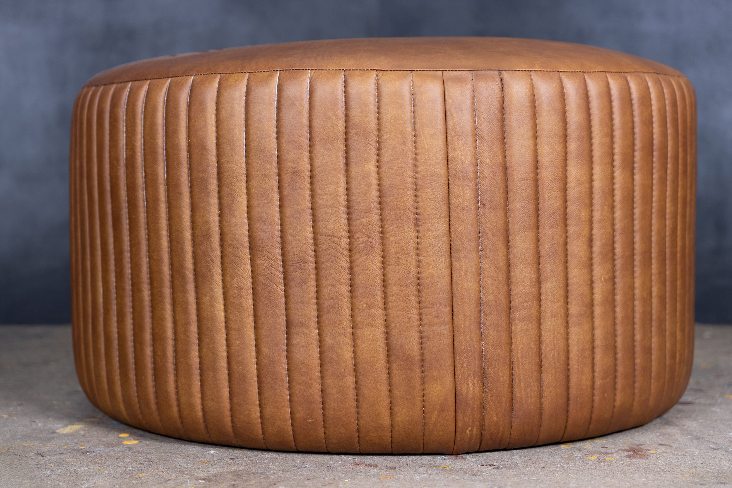 BOHEMIAN ROUND LEATHER OTTOMAN