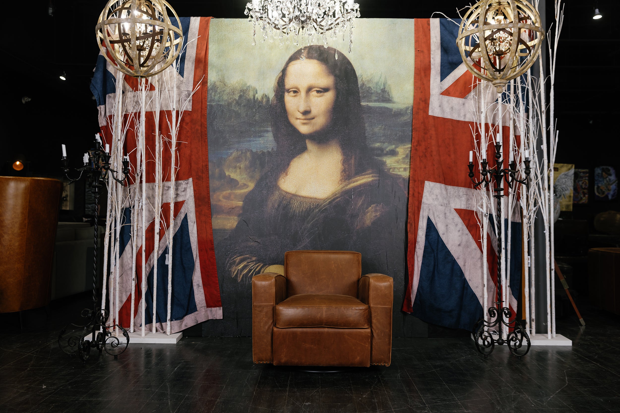 J DEAN LEATHER SWIVEL CHAIR FLOOR MODEL