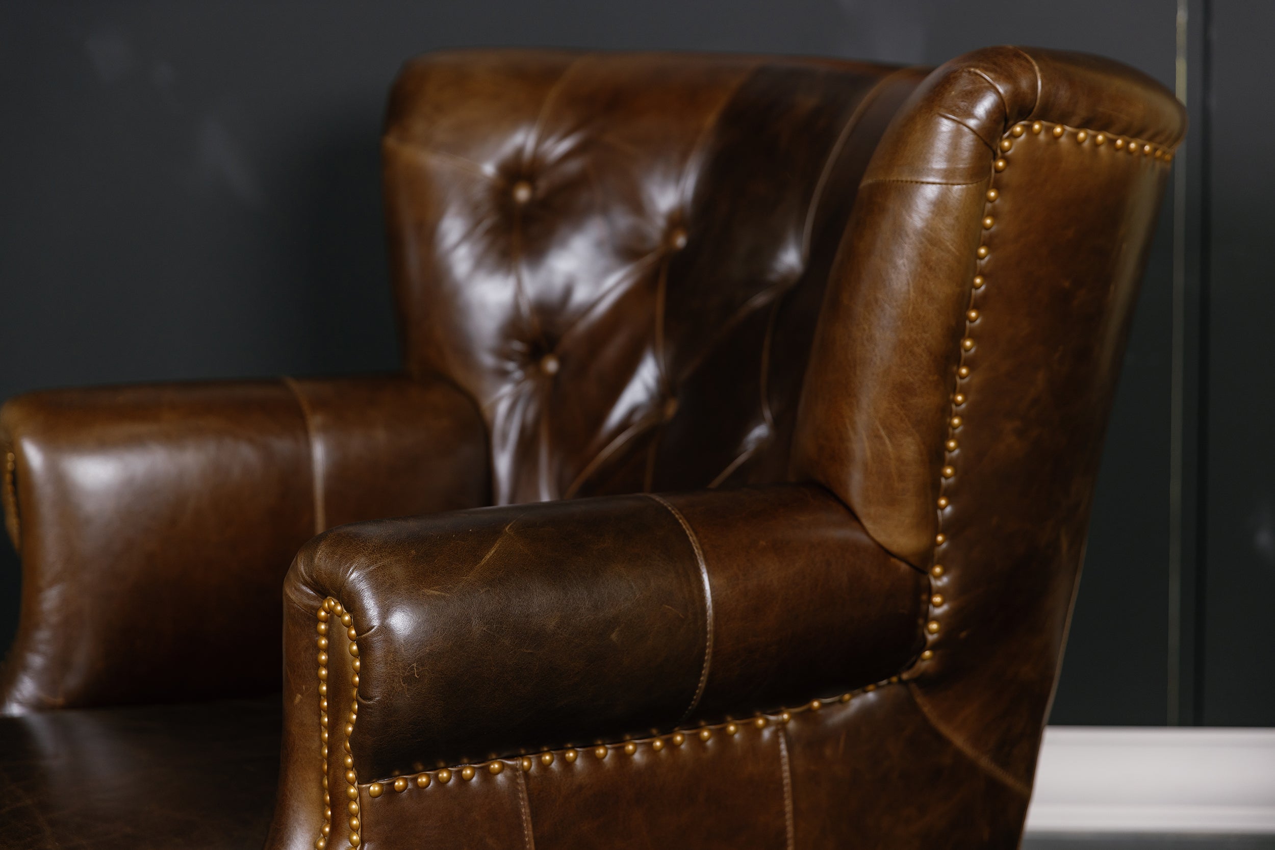 AFICIONADO CHAIR  FLOOR MODEL BROWN (SOLD)